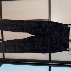 Lululemon high waisted camo capri leggings.